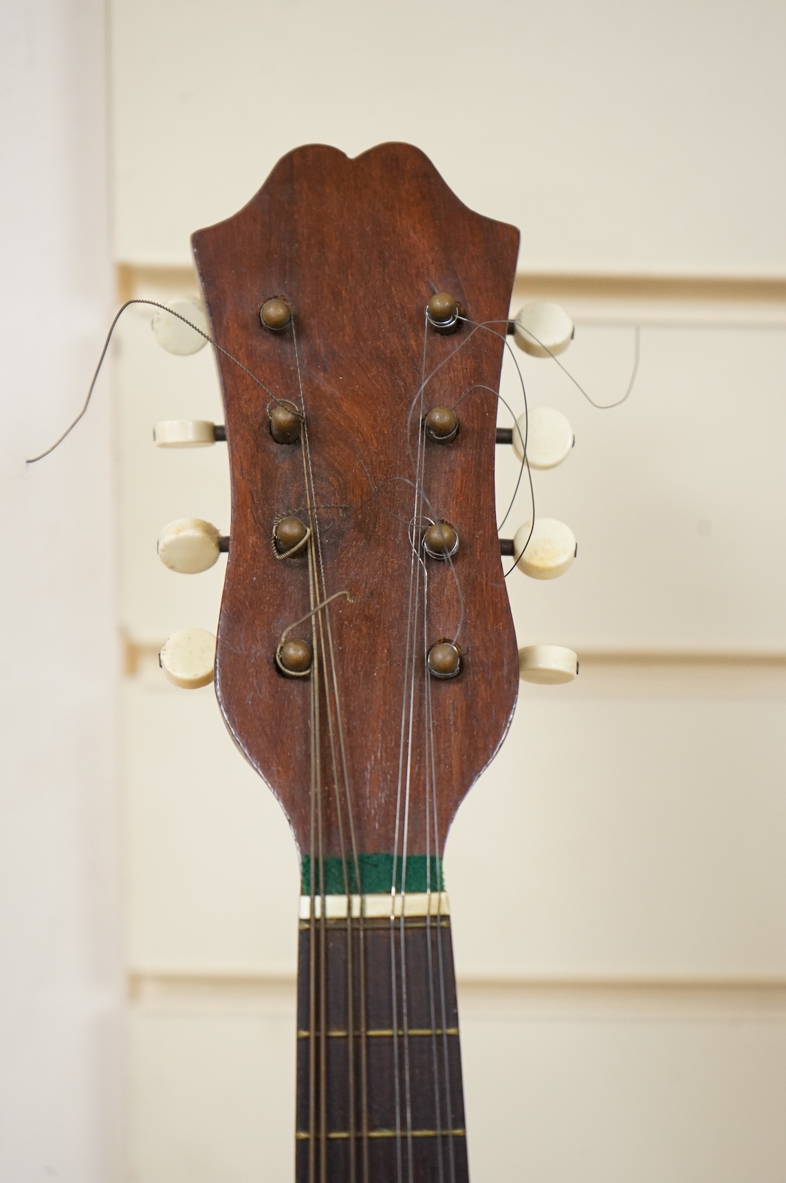 An early 20th century Italian cased mandolin by Carlo Ricordo, Napoli, with spruce soundboard inlaid with tortoiseshell